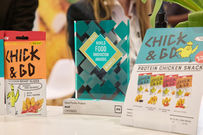MHP Chick & Go leaflets alongside their World Food Innovation Awards trophy in 2024
