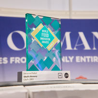 O'Kell's brewery's World Food Innovation Awards 2024 winning trophy on display at their stand at IFE, the Internaitonal Food and Drink Event