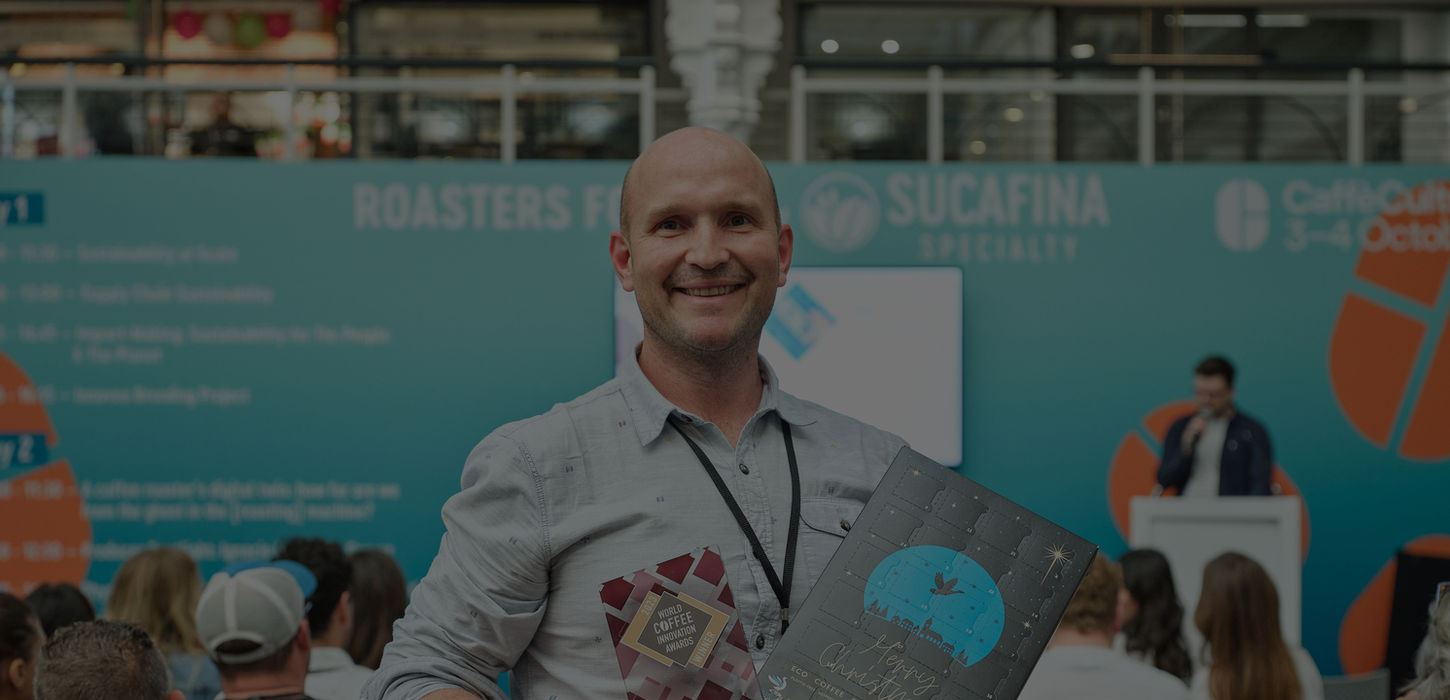 Winner of World Coffee Innovation Awards 2024 holding their trophy